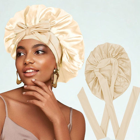 Donna con cuffia per capelli in seta beige con fiocco