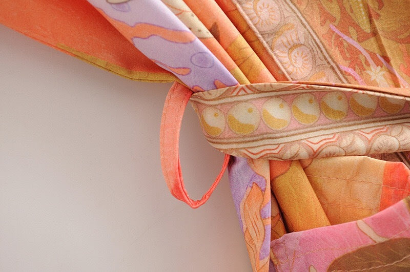 Dettaglio zanca per cintura kimono in chiffon floreale arancione - BellaSeta