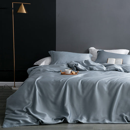 Completo lenzuola Premium in Ice Silk colore Grigio blu su letto matrimoniale