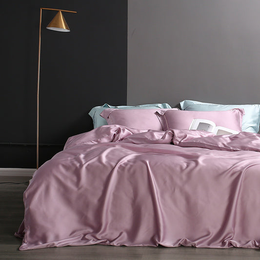 Completo lenzuola Premium in Ice Silk colore Viola su letto matrimoniale