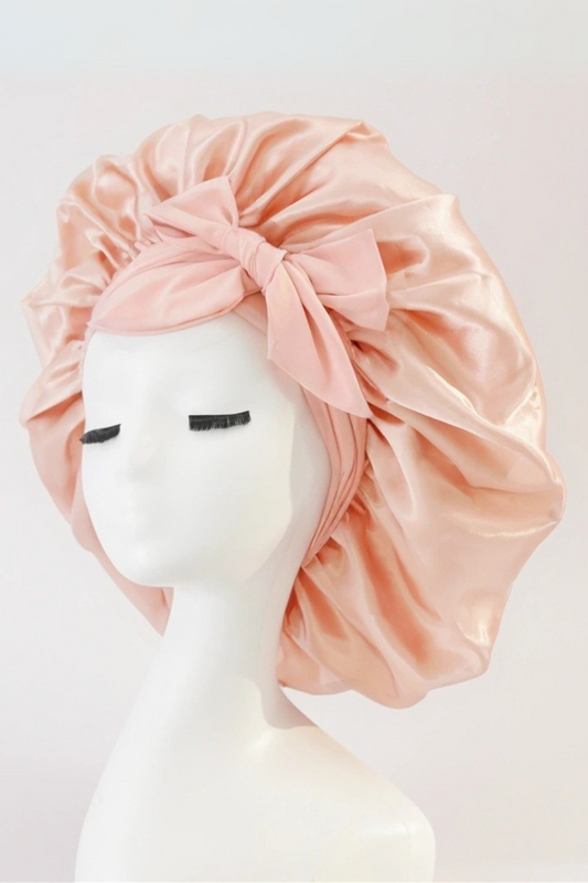 Cuffia in seta rosa con fiocco grande per capelli protetti durante il sonno Bella Seta